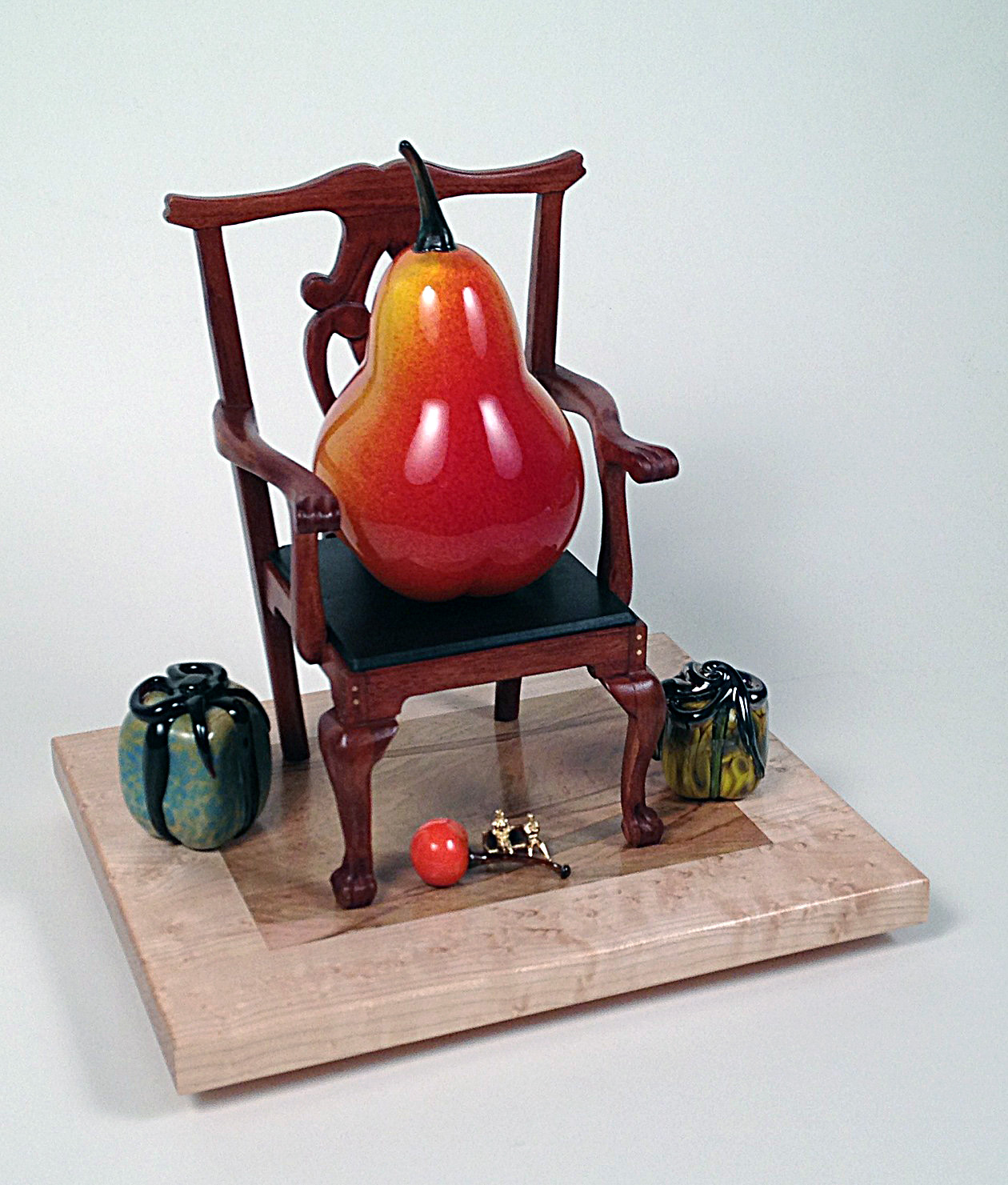 "Pear in a Chair"